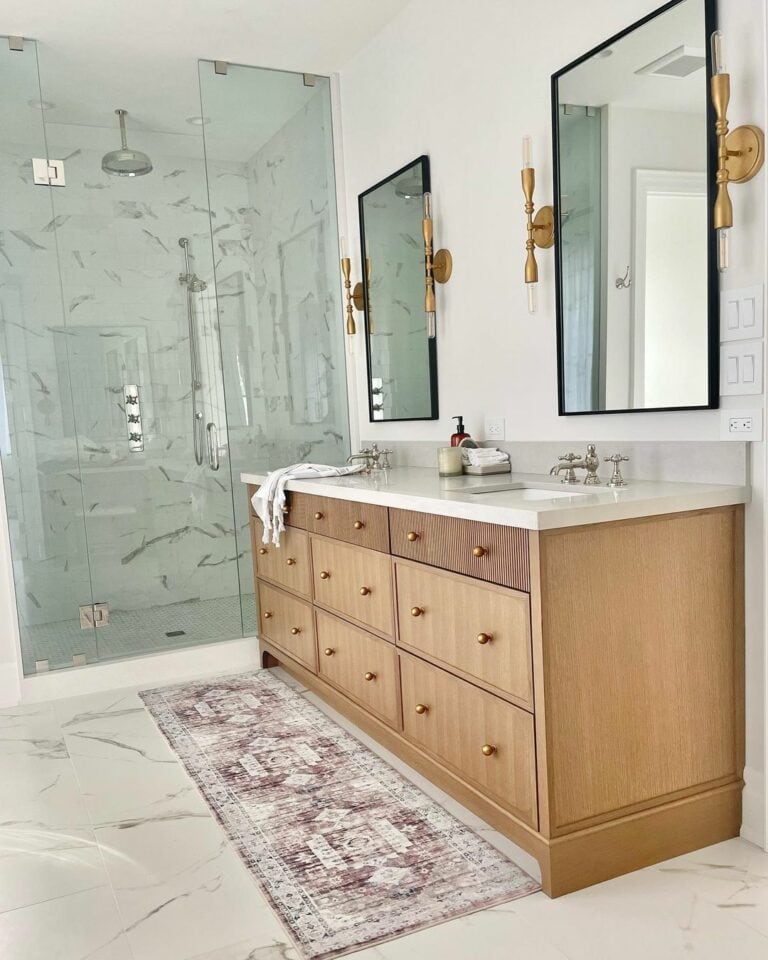 Brass Sconces Elevate a Bathroom Design