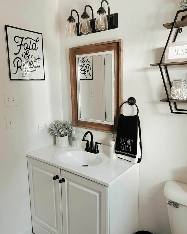 Off-white Washstand With Black Bathroom Towel Ring