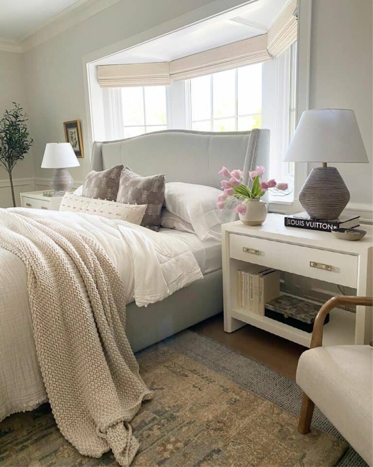 Wingback Bed Against Windows