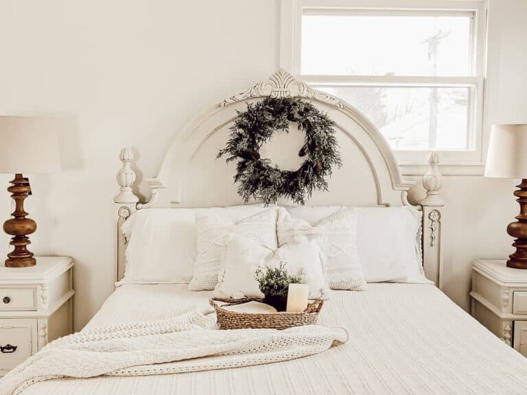 Antique Bed Accentuated by a Wreath