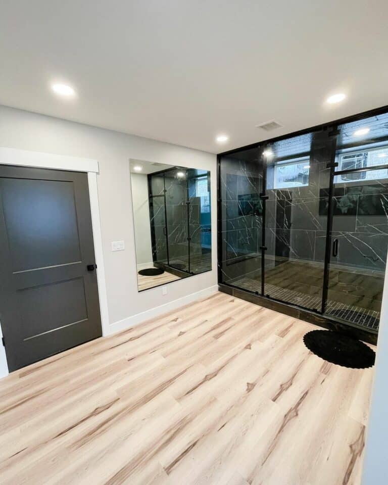 Master Bathroom With a Luxury Black Marble Shower