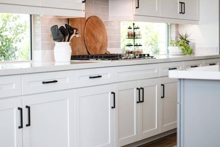 Angular Black Pulls and White Shaker Cabinets