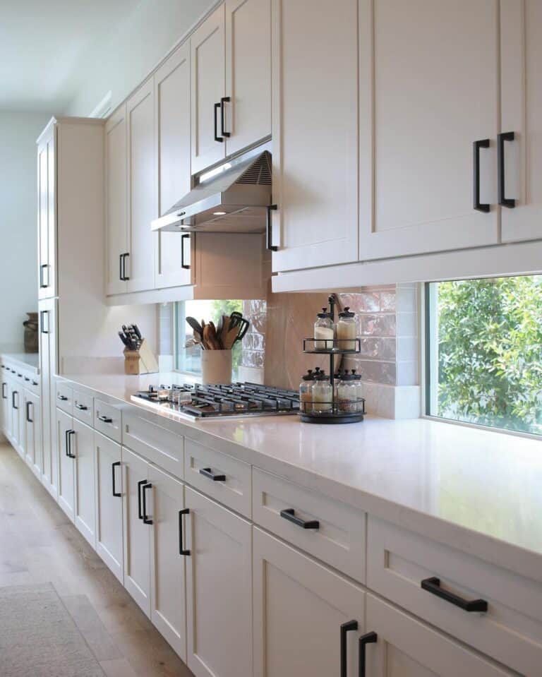 Long White Kitchen with Angular Black Pulls