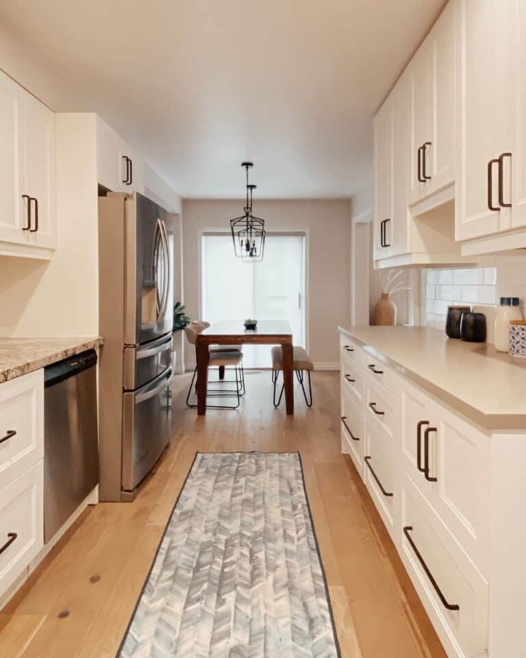 Off White Countertops with Rounded Black Handles