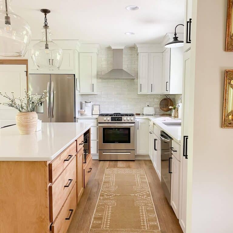 Long Angular Black Handles Attached to White Cabinets