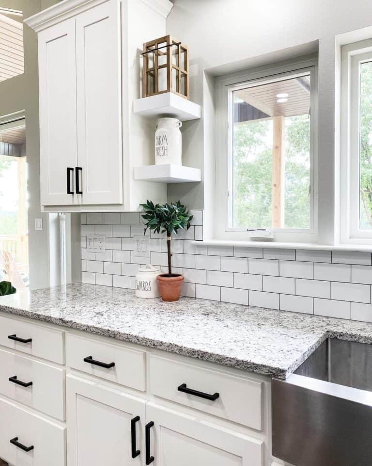 Thick Black Angular Pulls with a Granite Countertop