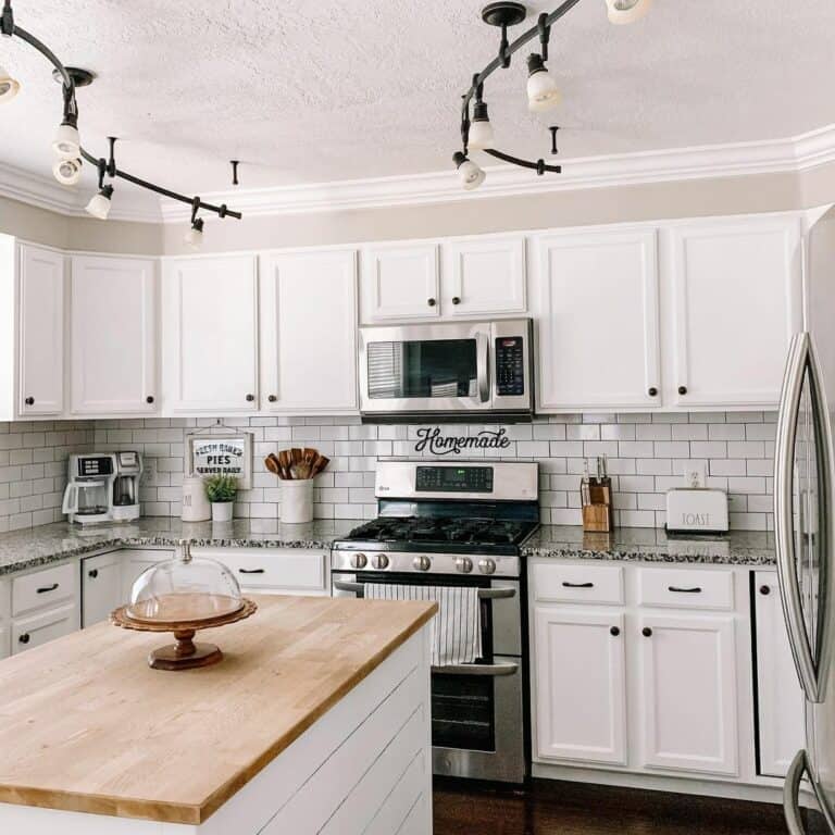 Black Knobs and Pulls Combined with Dark Grey Countertop