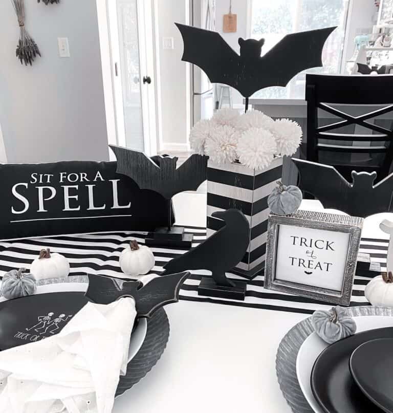 Black Centerpieces Mingle With White Mums