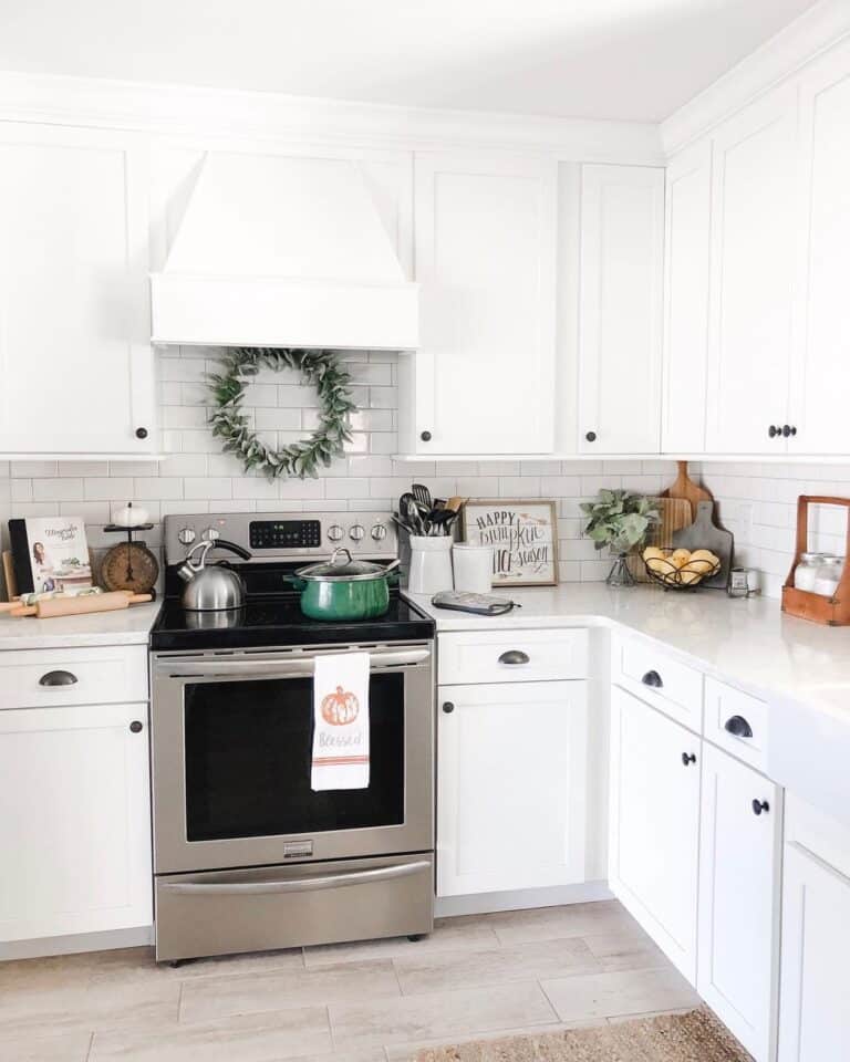 White Kitchen with Brass Cup Pulls