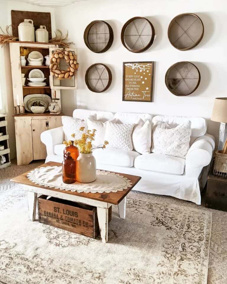 Black Decor Over White Sofa With White Pillows