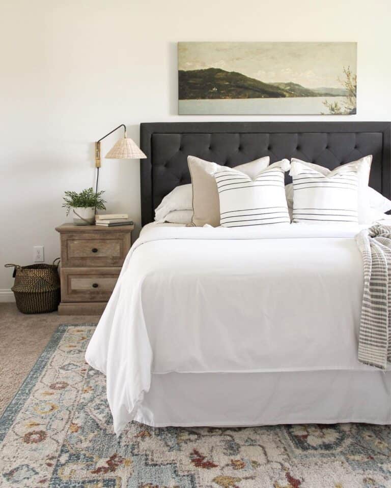White and Gold Pillows Strewn on a White Coverlet