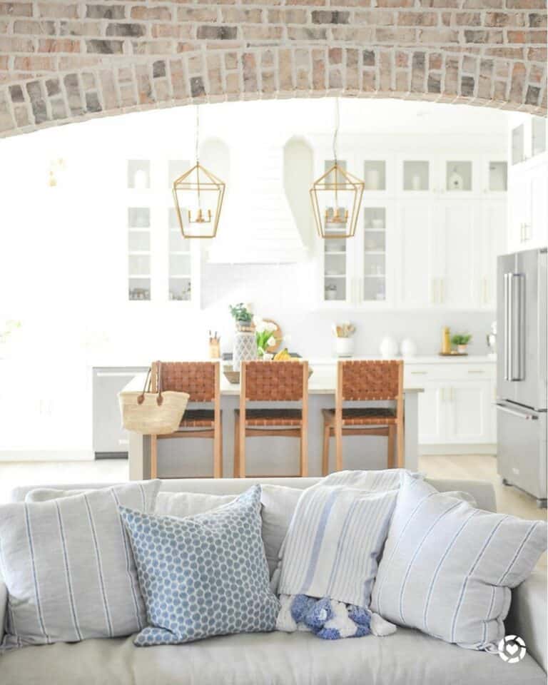 Gray Couch Under Brick Archway