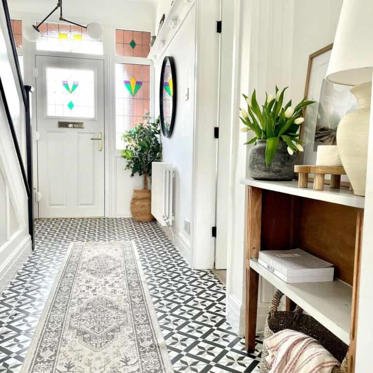 Entryway With Monochromatic Geometric Floor Tiles