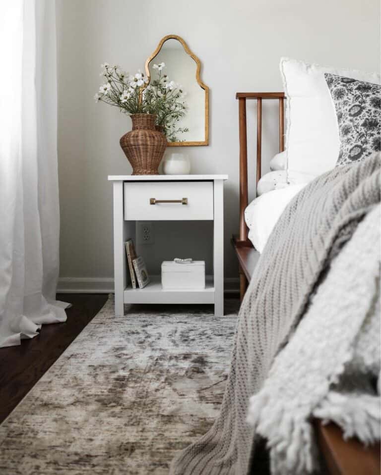 Wood Spindle Bed Frame Beside Mirror