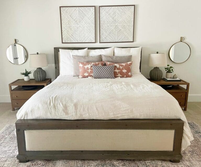 Rounded Mirrors Behind Nightstands with Lamps