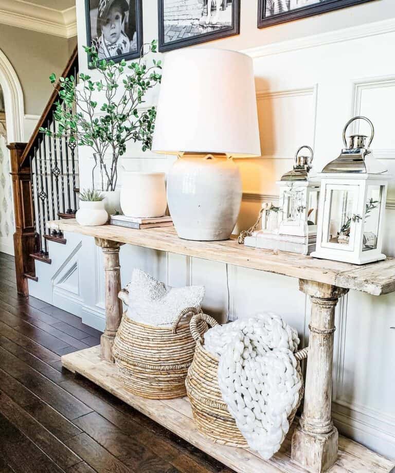 Consul Table with Three Unglazed Ceramic Pots and Plants