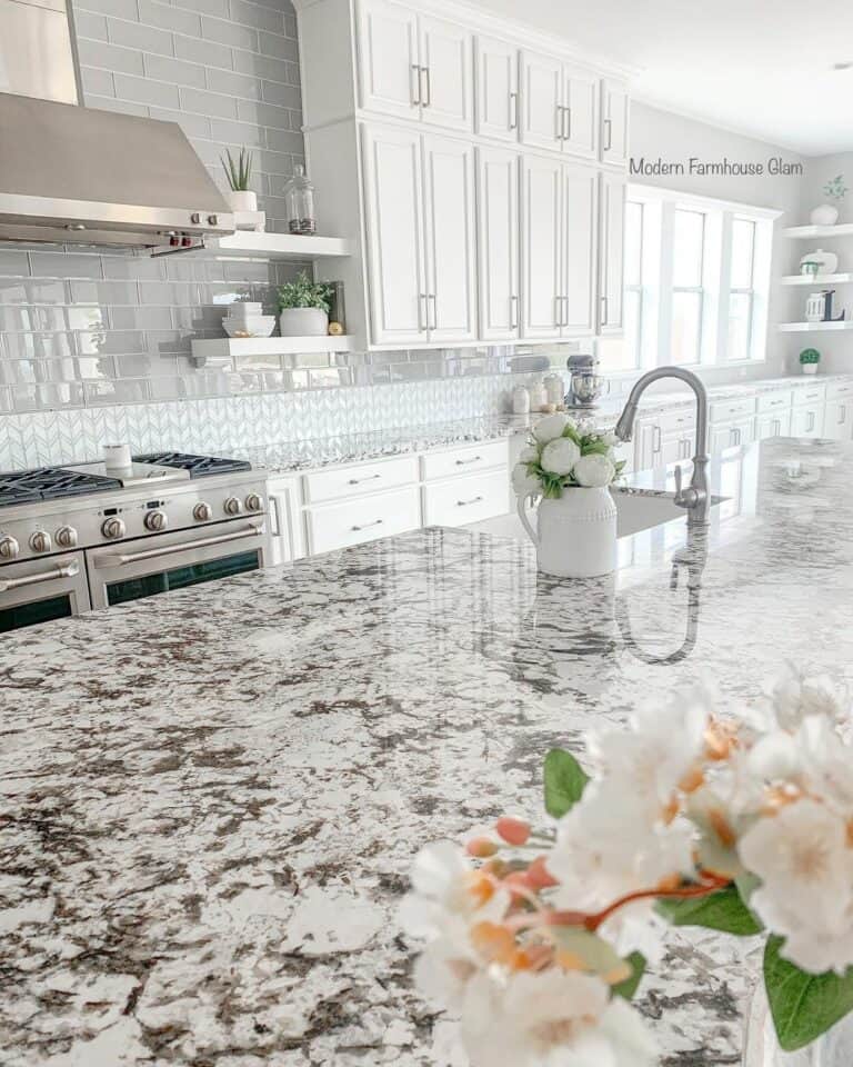 Glossy White Pitcher with Peonies on Kitchen Counter