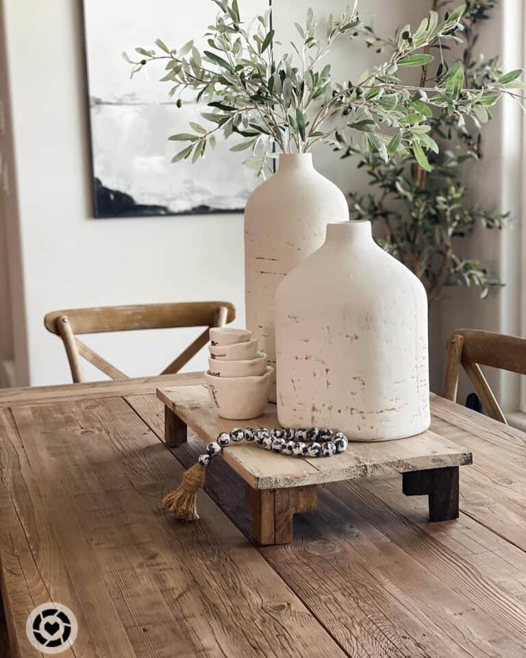 Two Wide Ceramic Bottles on Wood Pedestal