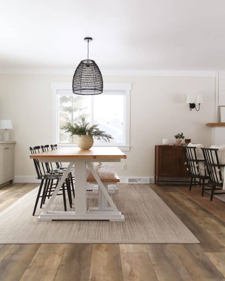 Black Rattan Hanging Lamp Against Off-White Walls