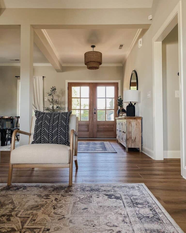 Rattan Hanging Light Over a Brown Entryway Rug
